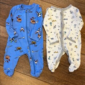 Lot of 2  1 Nike Sports Print Blue Footie 1 Carter Doggies Thermal Footie SizeNB